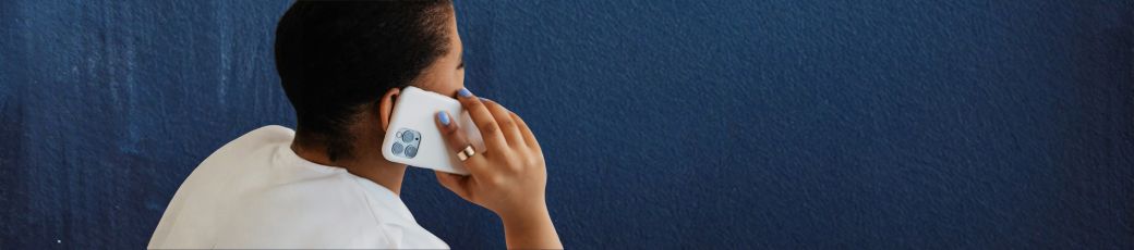 Person speaking on the phone seeking legal advice after an accident in McAllen, Texas