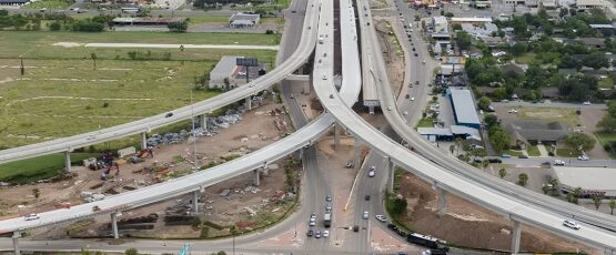 Aerial view of a major highway interchange and busy roadways in McAllen, Texas, illustrating traffic congestion and potential accident risks in the Rio Grande Valley.
