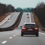 Driver traveling on a highway while following a safe speed limit