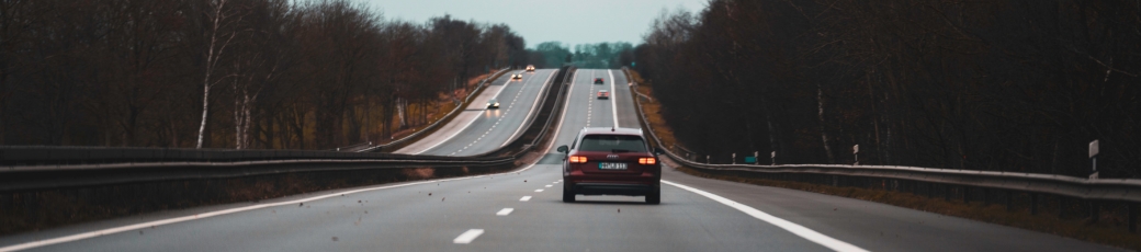 Driver traveling on a highway while following a safe speed limit