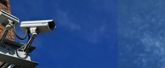 Security surveillance cameras outside a building used to capture potential accident evidence