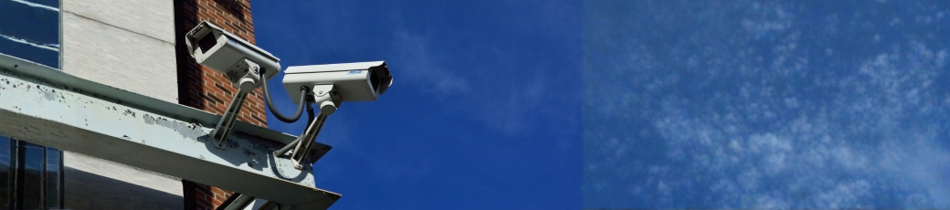 Security surveillance cameras outside a building used to capture potential accident evidence